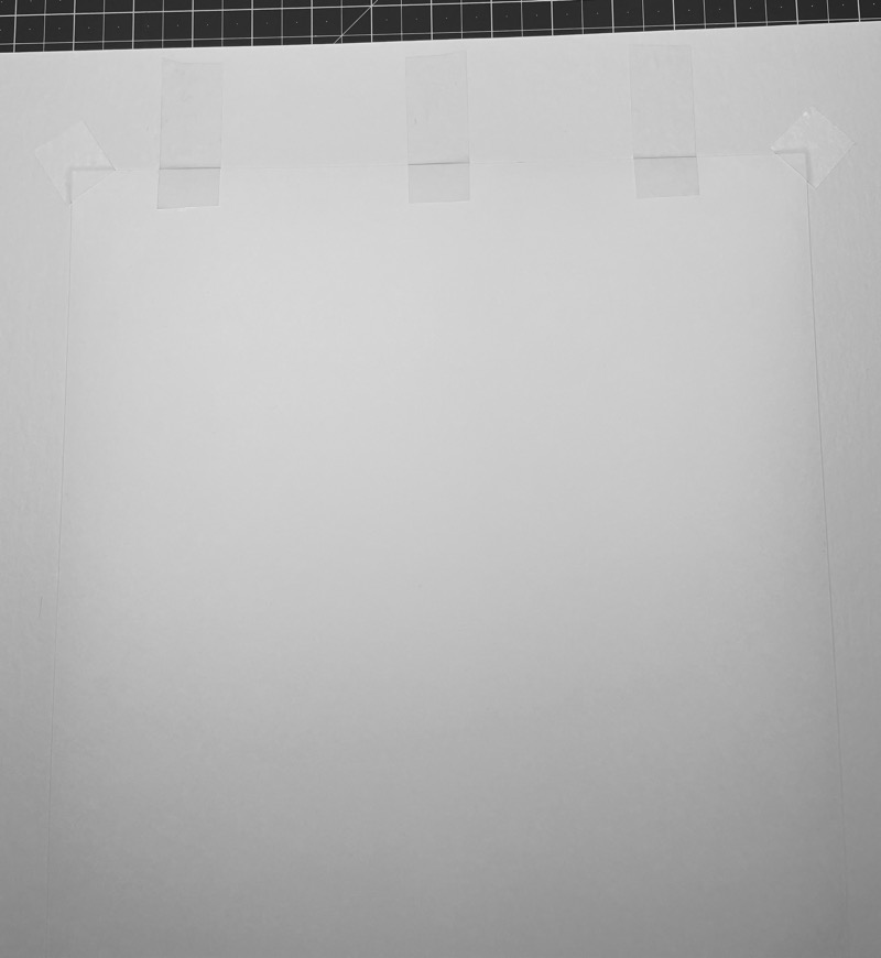 print with hinge tape applied at the top