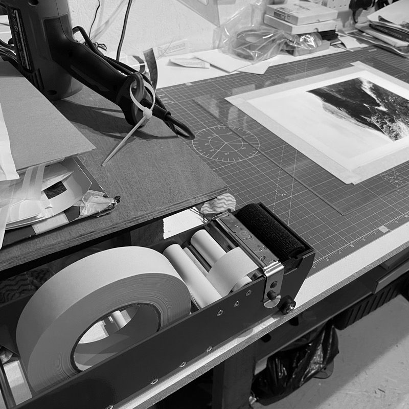 gummed tape dispenser on a worktop