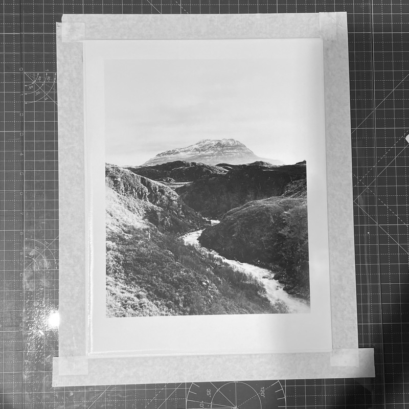 print taped on glass